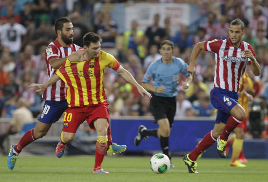 Lioneol Messi (c) sufri un golpe en el partido de la Supercopa de Espaa.