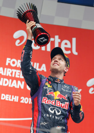 El piloto alemn Sebastian Vettel celebra su cuarto ttulo consecutivo en la Frmula Uno.