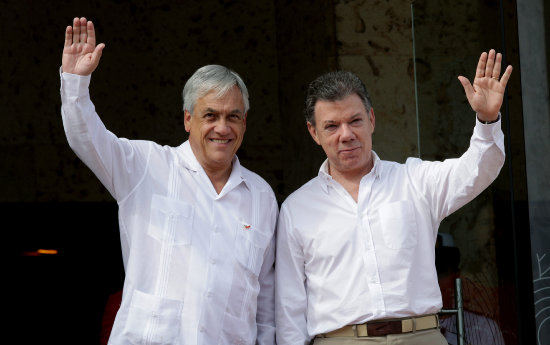 PROTESTA. El Presidente chileno se encuentra en Cartagena de Indias, Colombia.