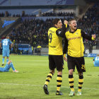 El delantero polaco del Borussia Dortmund Robert Lewandowski (i) y Lukasz Piszczek celebran la victoria del equipo alemn sobre el Zenit ruso.