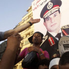 APOYO. Las calles de El Cairo fueron empapeladas con la imagen del lder de las Fuerzas Armadas.