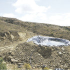 MITIGACIN. El lquido de la basura que se escurre a una posa est siendo bombeado a esta piscina para su tratamiento.