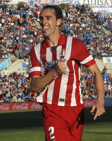 El defensor uruguayo Diego Godn abri el camino del triunfo para el Atltico de Madrid.