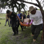 RESCATE. Cuerpos de personas ahogadas.