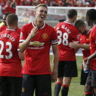 Los jugadores del Manchester United celebran uno de los goles en el triunfo sobre el Real Madrid, ayer, en Estados Unidos.