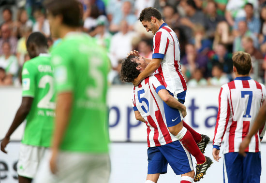 Koke (i) y Tiago festejan la goleada del Atltico de Madrid.