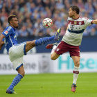 Xabi Alonso (d) debut con la camiseta del campen alemn.