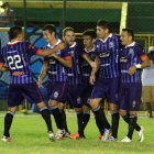 Los jugadores de la academia crucea celebran el triunfo que les dio el liderato del Torneo Apertura de la Liga.