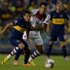 Una escena del partido de anoche, en Buenos Aires, entre Boca Juniors y Cerro Porteo.